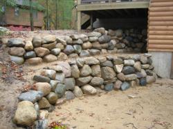 michigan granite fieldstone boulder retaining wall